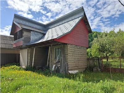 Casa cu 2360 mp teren, Racoasa